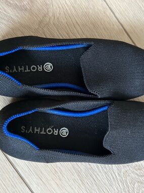 Rothy's Black Slip-On Loafers with Bright Blue Trim